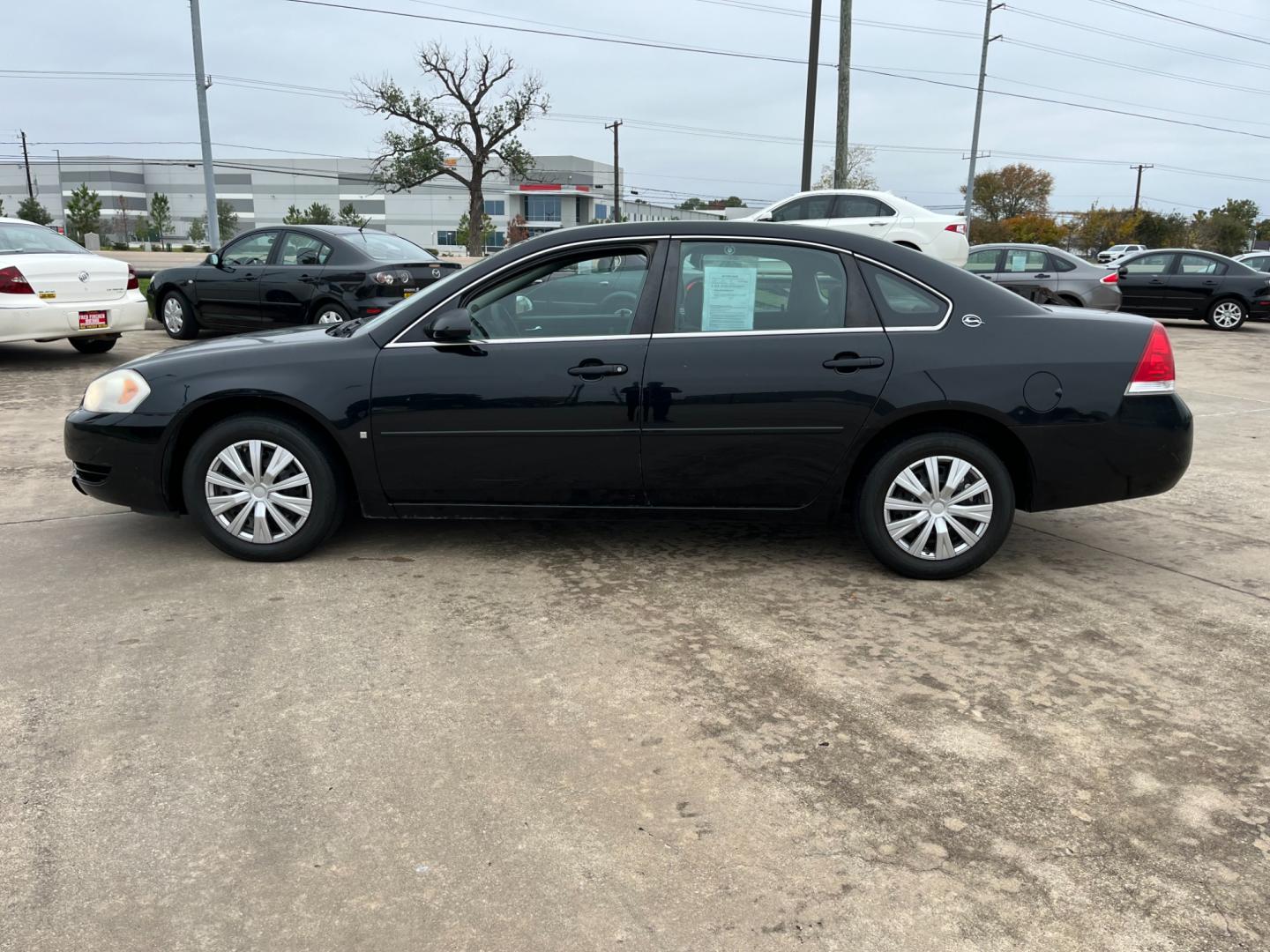 2008 Black /gray Chevrolet Impala LS (2G1WB55K381) with an 3.5L V6 OHV 16V FFV engine, 4-Speed Automatic Overdrive transmission, located at 14700 Tomball Parkway 249, Houston, TX, 77086, (281) 444-2200, 29.928619, -95.504074 - Photo#3